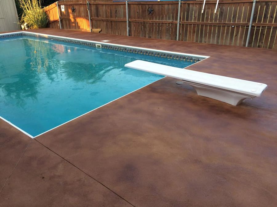 small stained concrete pool deck in Dallas TX