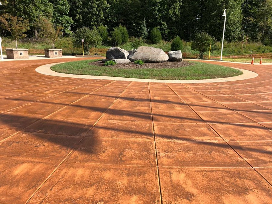 A patterned stained concrete driveway for a home in Dallas TX